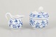 Meissen, sugar bowl and creamer.Elegant porcelain set in the Blue Onion pattern, featuring the ...