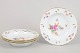 Meissen, set of four deep pasta plates.Elegant porcelain set in the Saxon Flower pattern, ...