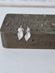 Leaf-shaped earrings in sterling silverStamp: BOG - 925Length 16 mm. Width 6 mm.Weight ...