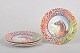 Gien "Savane", set of four plates.Set of four faience plates in the Savane pattern with a ...