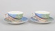 Gien "Savane", pair of large morning cups with matching saucers.Pair of large faience morning ...