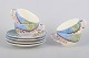 Gien "Savane", set of four coffee cups with matching saucers.Set of four faience coffee cups ...
