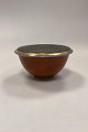 Royal Copenhagen Crackle Bowl No. 212/2620. Siena red with gold. Measures 16.3 cm x 8.5 cm / ...