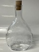 Brandy bottle with cork and the text 1842-1967"Brandy bottle for an individual" was ...