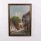 Oil painting on canvas depicting a street scene with a half-timbered house and a church tower. ...