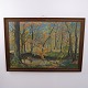 Oil painting on canvas depicting an autumn forest with a stream. The painting is signed, was ...