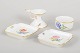 Meissen, candlestick, small bowl and two small dishes.Collection comprising a candlestick, a ...