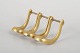 Carl Auböck for Illums Bolighus, pipe holder.Sculptural solid brass pipe holder with four ...