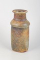 Stig Lindberg for Gustavsberg, vase.Sculptural stoneware vase with a cylindrical body, ...