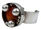 Jacob Hull (1919–1993), Silver-plated metal bangle with large orange center from between 1960 ...