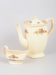 Adams England, coffee pot and creamer.Coffee pot and creamer in porcelain decorated with a ...