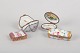 Set of Four Lidded Boxes from Limoges, France.A set of four hand-painted porcelain lidded ...