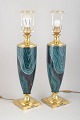 Le Dauphin, set of two table lamps.Large table lamps in brass with decorative ceramic bodies ...