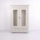 Antique display cabinet with a grey-painted finish, glass doors and drawers in the lower ...