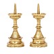 A pair of early 17th-century miniature brass altar candlesticksH: 14cm. Base D: 6,1cm