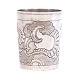 Russian silver beaker with chased decoration in the form of stylised foliage, rocaille ornaments and an eagle. Hallmarked Moscow, 1761. H: 8 cm