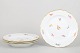 Meissen, set of four dinner plates.Set of four dinner plates in white porcelain with ...