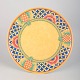 Laure Japy, serving platter.Round porcelain serving platter with a yellow glaze and a ...