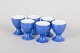 Laure Japy, set of six egg cups.Set of six porcelain egg cups with a white glaze and blue ...