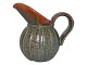 Michael Andersen ceramics from Bornholm, milk jug.Height 18.0 cm., length 18.5 cm.There ...