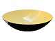 Herbert Krenchel, large and rare bright yellow Krenit bowl with black glossy exterior.It is ...