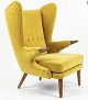 Stunning, newly upholstered Svend Skipper "Teddy Bear" chair in exquisite yellow fabric. Teak ...