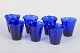 Set of seven Swedish cobalt blue drinking glasses.