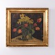 Decorative flower painting depicting tulips. The painting is presented in a gilt frame and is ...