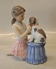 0452 RC Girl dressing a dog a butterfly 17 x 16 cm from the series animal pets (1249452) Royal ...