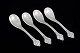 Evald Nielsen, set of four salt spoons.Set of four hand-hammered salt spoons in 830 silver, ...