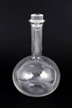 Ole Palsby for Georg Jensen, wine decanter.Elegant wine decanter in clear glass with a ...