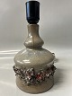 Table lamp in ceramic, raw knobbed structure with light ...