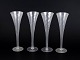 Set of four Swedish champagne glasses.Set of four tall champagne glasses, crafted in clear ...