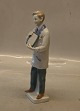 Hairdresser with mirror, 25 cm; professional figure stamped with a crown; male hairdresser.