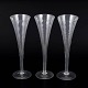 Set of three Swedish Champagne GlassesSet of three tall champagne glasses, crafted in clear ...