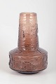Göte Augustsson for Ruda Glasbruk, vase.Sculptural vase in thick pink glass with a ...