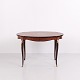 Mahogany salon table / side table from the 1920s, executed in Rococo style with marquetry and ...