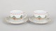 Royal Copenhagen Christmas Joy, pair of coffee cups with saucers.Pair of porcelain coffee ...