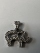 Elephant pendant in 14 Karat white gold with inlaid diamonds.Height with eyelet. 1.7 ...