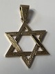 Star of David pendant in 14 Karat gold.Height with loop. 3.3 cm.Width. 2.1 cm.Stamped HSP ...