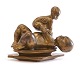 Bronze sculpture by Kai Nielsen, 1882-1924, in the shape of a girl holding a baySignedH: ...