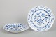 Meissen, pair of Blue Onion dinner plates.Pair of white porcelain dinner plates with ...