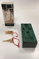 Georg Jensen Christmas Classics - Pine Cone and Cornet 2005Gold-plated brassDesign: Regitze ...