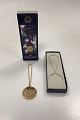 Georg Jensen Millennium Ornament 1999 - 2010Gold-plated brass