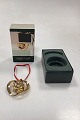 Georg Jensen Christmas Classics - Christmas Rose 2008Gold-plated brassDesign: Regitze Overgaard