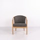 Bella armchair designed by Finn Østergaard for Stouby. The chair is made in light wood with ...