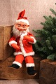 Sweet old store Santa Claus with felt clothes, papier-mâché head and foam rubber body, as well ...