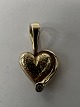 Heart pendant with inlaid diamond 14 carat Gold.Stamped JAa 585.Height with eyelet 1.8 ...