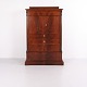 Antique tall cabinet from the 19th century with a combination of enclosed storage and multiple ...