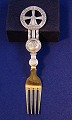 Michelsen Christmas spoons and forks of Danish gilt sterling silver. Anton Michelsen Christmas ...